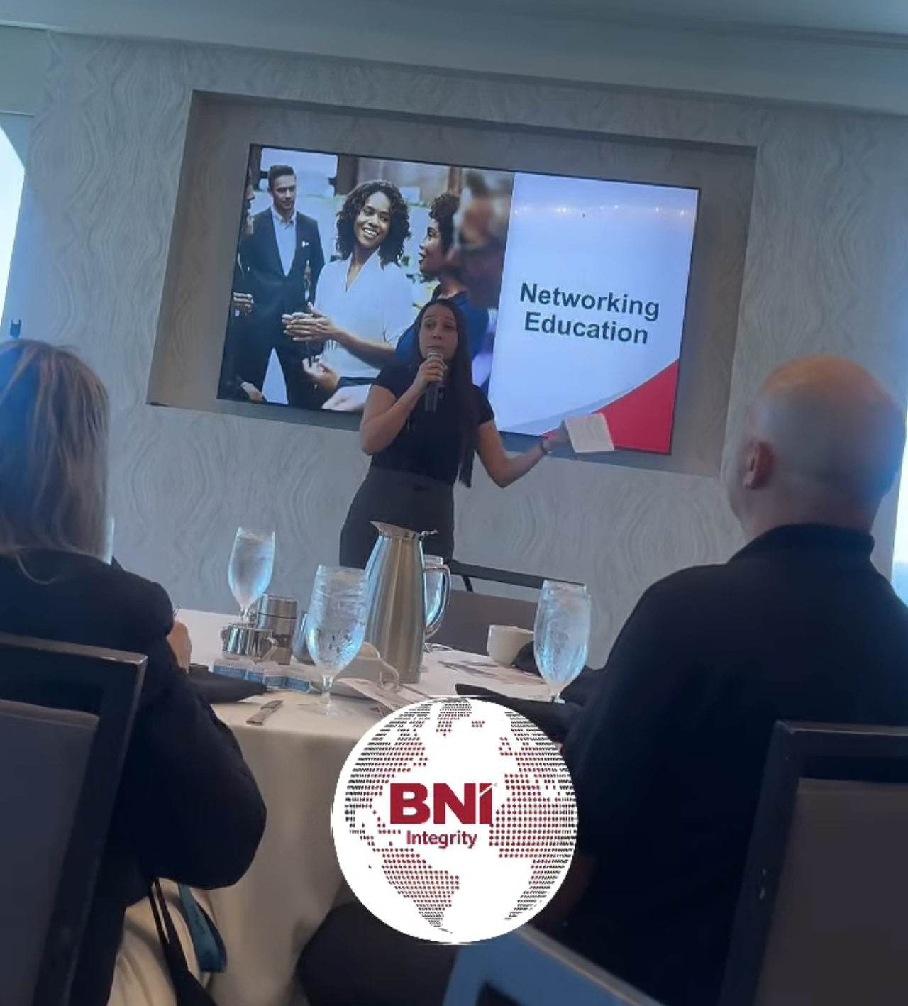 Member speaking during networking education segment