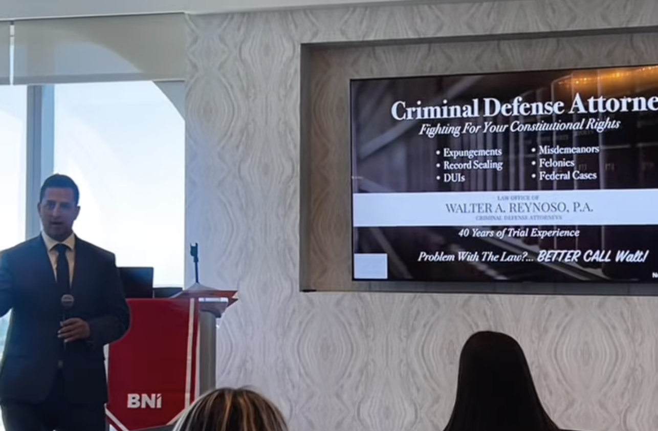 Member delivering a criminal defense presentation